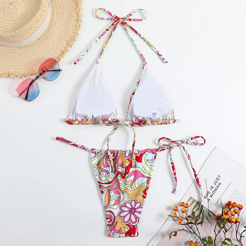 Women's triangle printed bikini set with hanging neck design in multicolour pattern