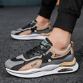 Men's grey breathable mesh casual trainers with a round toe and lightweight EVA sole.