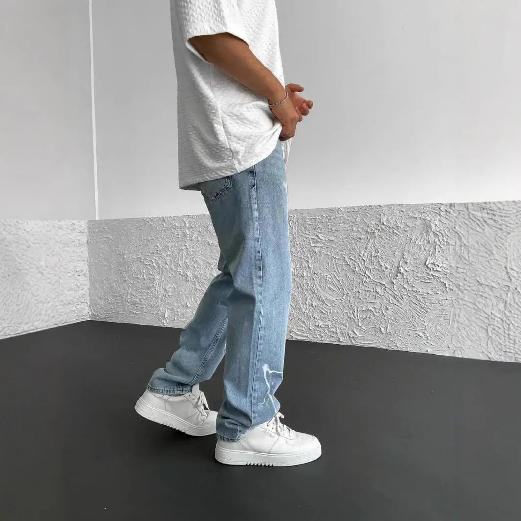 Men's straight-leg denim trousers in loose wide-leg fit with solid colour print and zipper fly