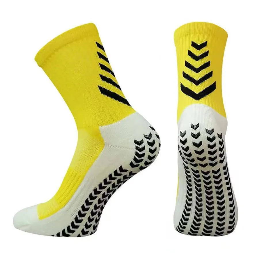 Men's mid-calf athletic socks with geometric patterns and silicone non-slip grip elements