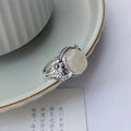 Copper vintage ring with adjustable open mouth design in antique white chalcedony colour