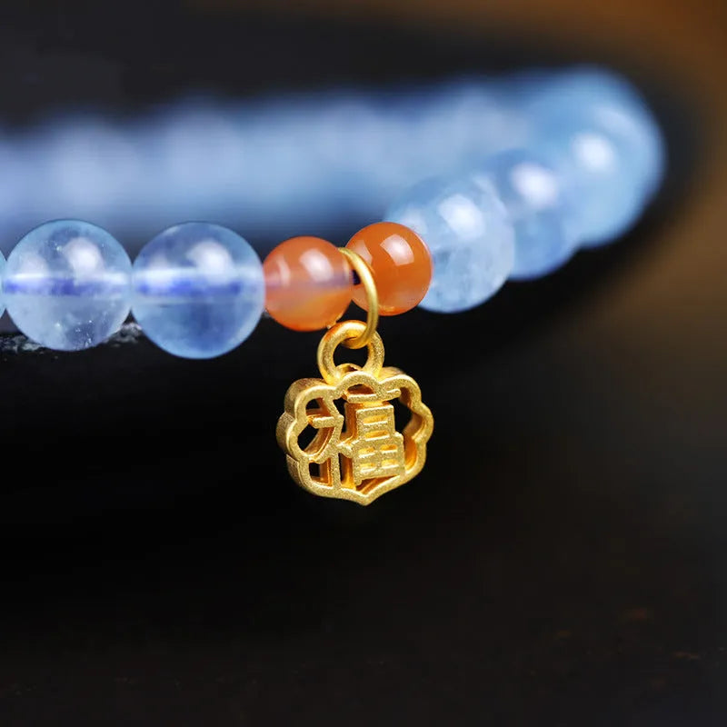 Women's bracelet with 8mm ice translucent aquamarine crystal beads and sequin details