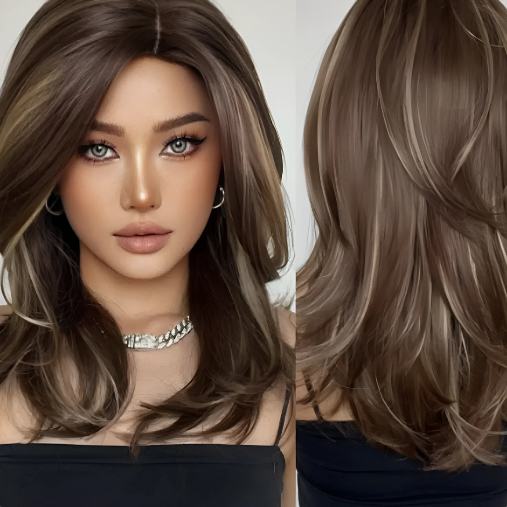 Mid-length curly synthetic wig with gradient colour and long bangs on a wig stand.