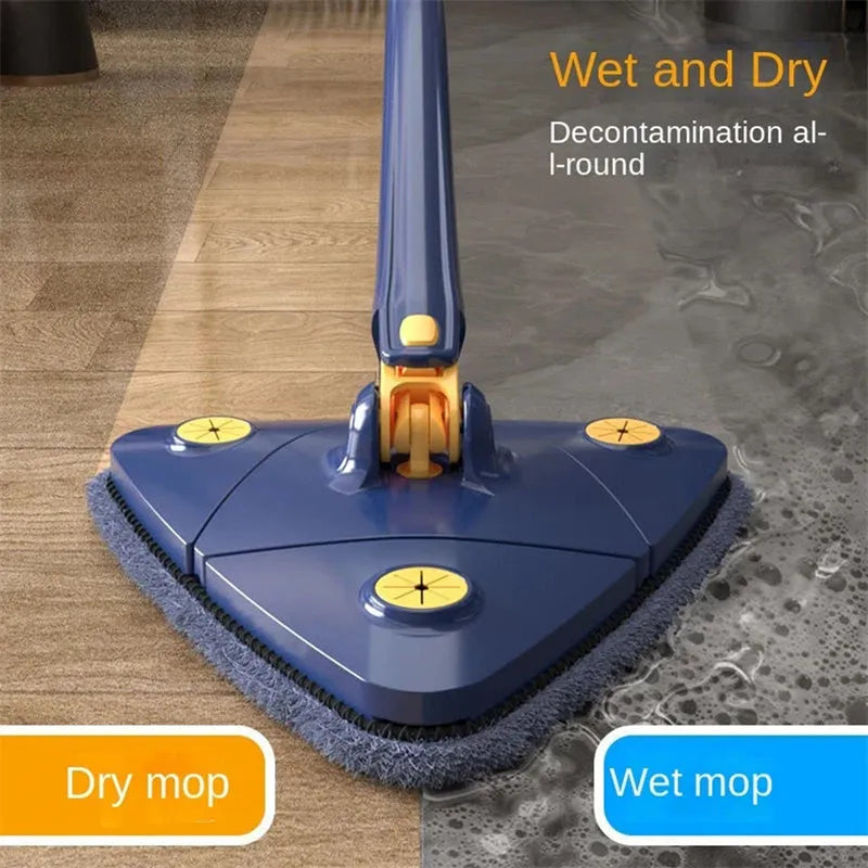 Blue extendable triangle mop with rotating head and microfibre cloth on a tiled floor.