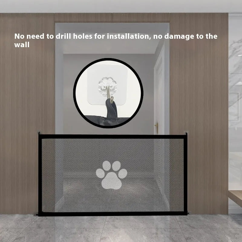 Portable folding dog barrier with cloth net and plastic frame shown with removable doorsill accessory featuring dog footprints