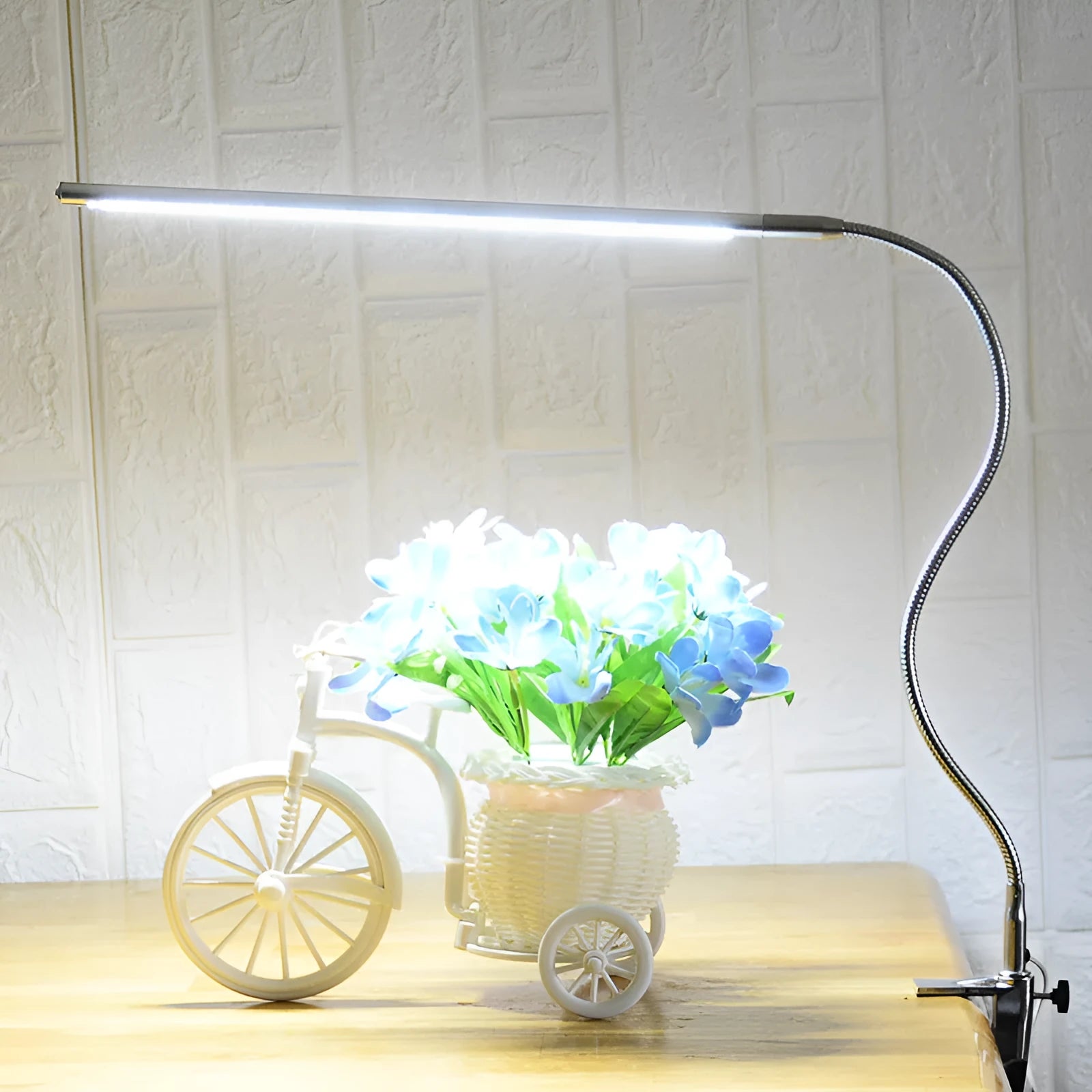 Silver aluminium alloy USB LED table lamp with a long arm and clip, showing 48 SMD beads for nail lighting.