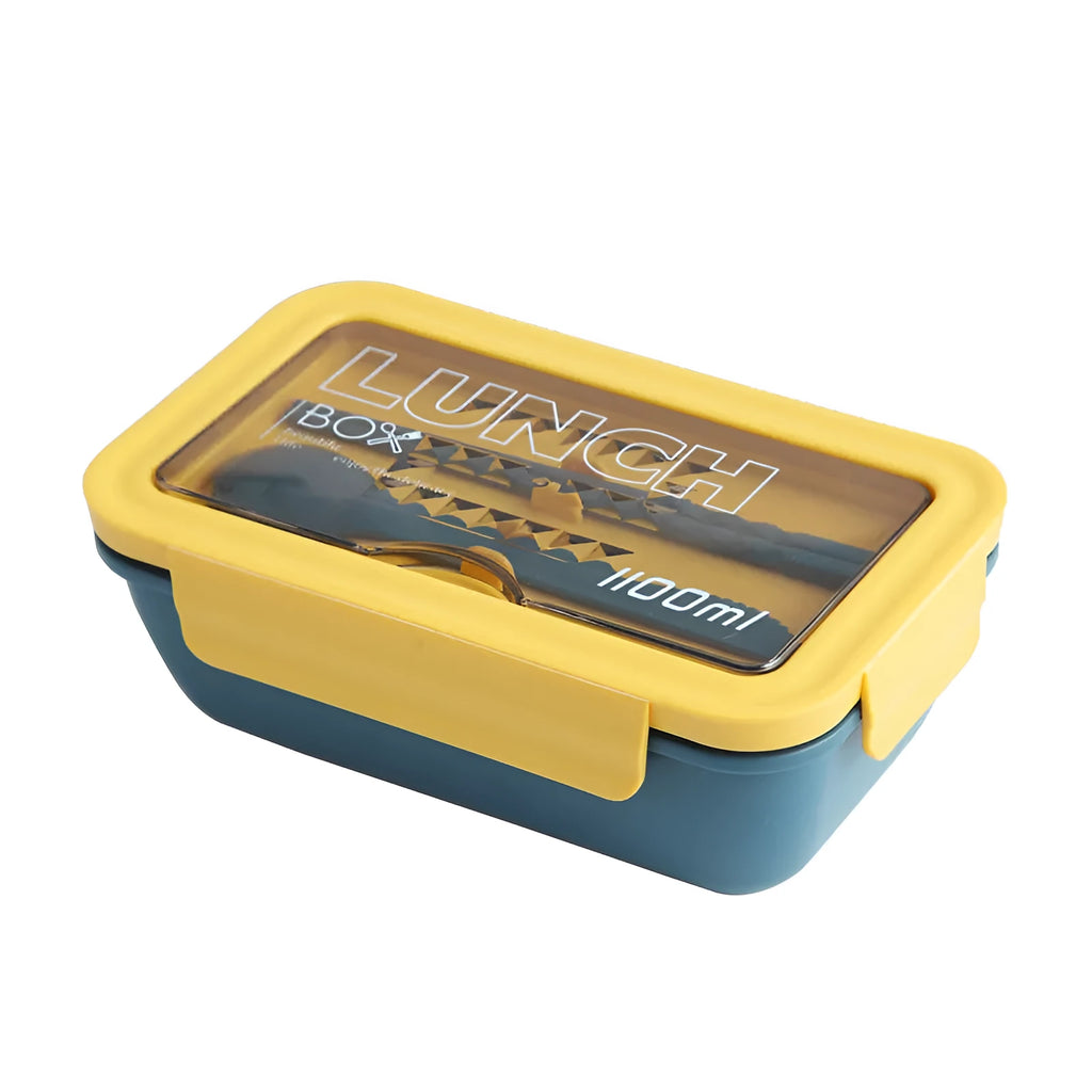 Green partitioned bento box with four food compartments showing Nordic design
