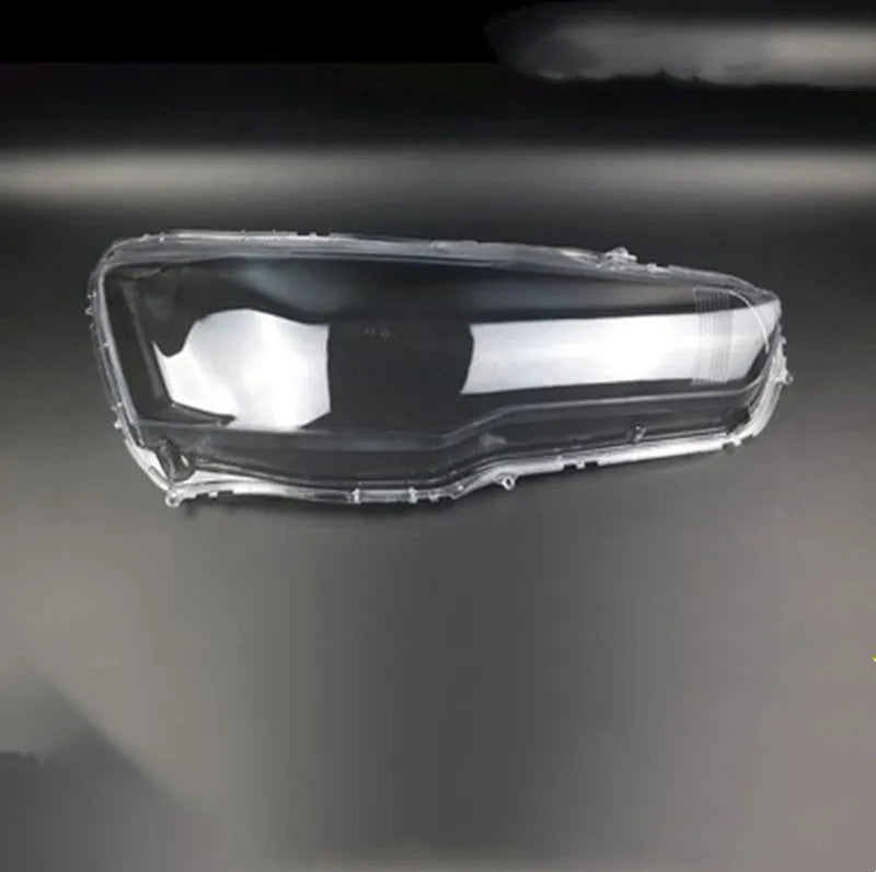 Transparent plastic headlight housing covers for main driver and co-pilot vehicle lamps