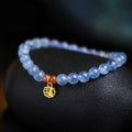 Women's bracelet with 8mm ice translucent aquamarine crystal beads and sequin details