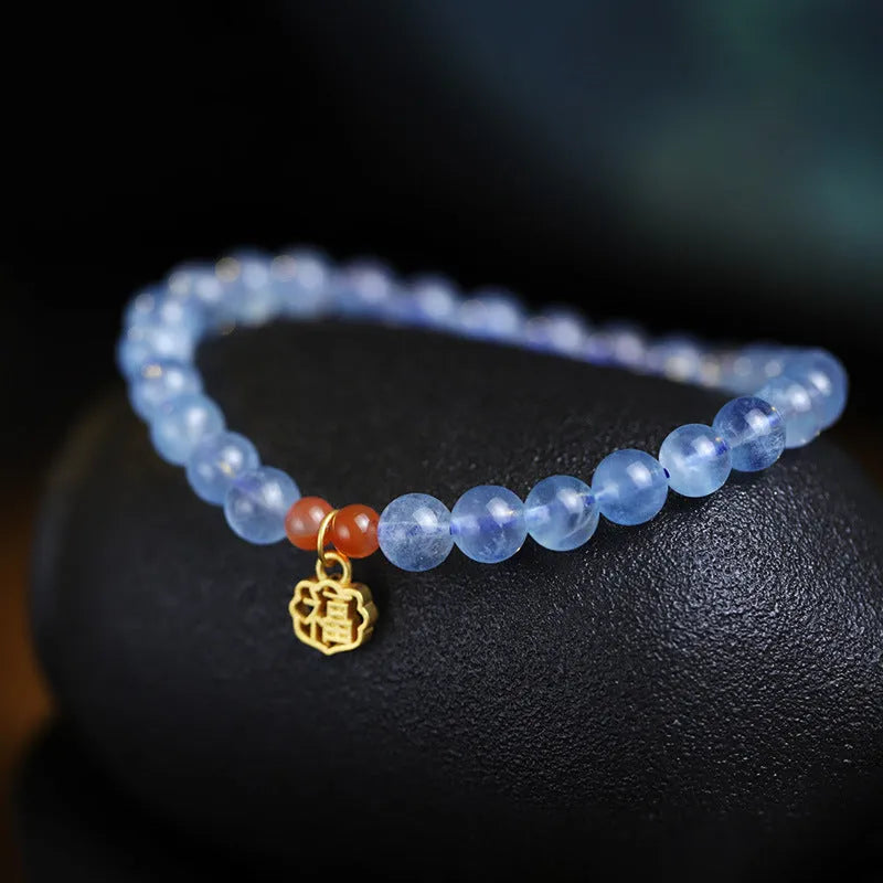 Women's bracelet with 8mm ice translucent aquamarine crystal beads and sequin details
