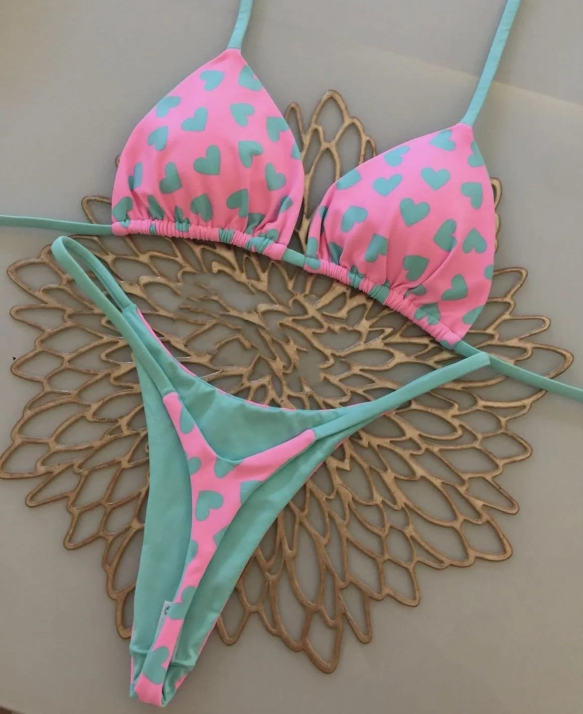 Sexy backless split swimsuit with heart printing in blue and pink colour options