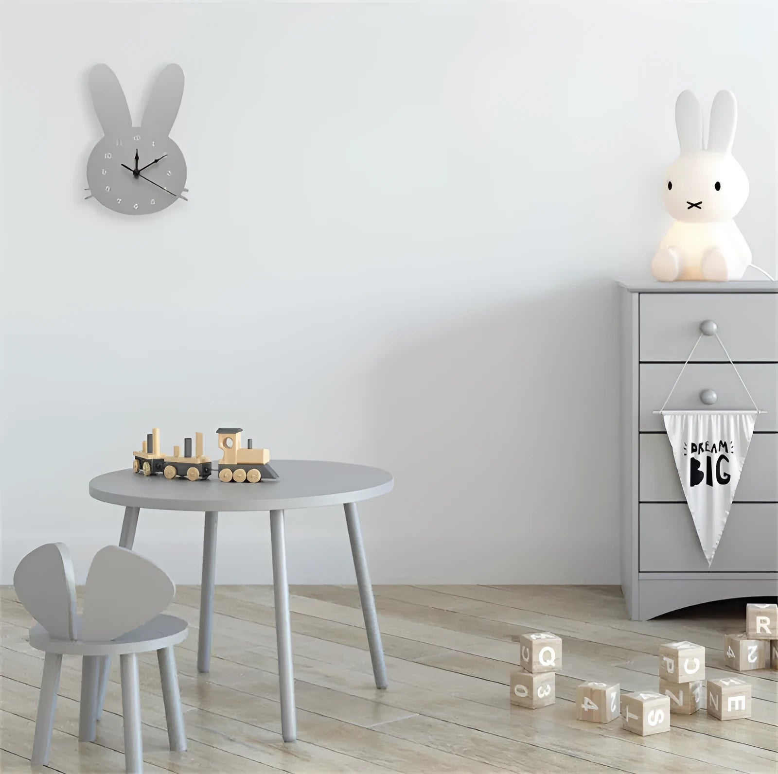 Wooden cartoon wall clock with colourful character design for a child's bedroom.