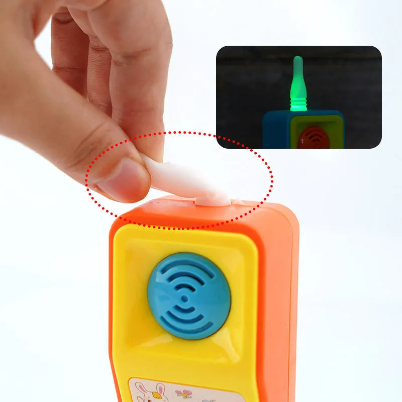 Children's battery-powered educational toy with cartoon animal theme producing sound and light