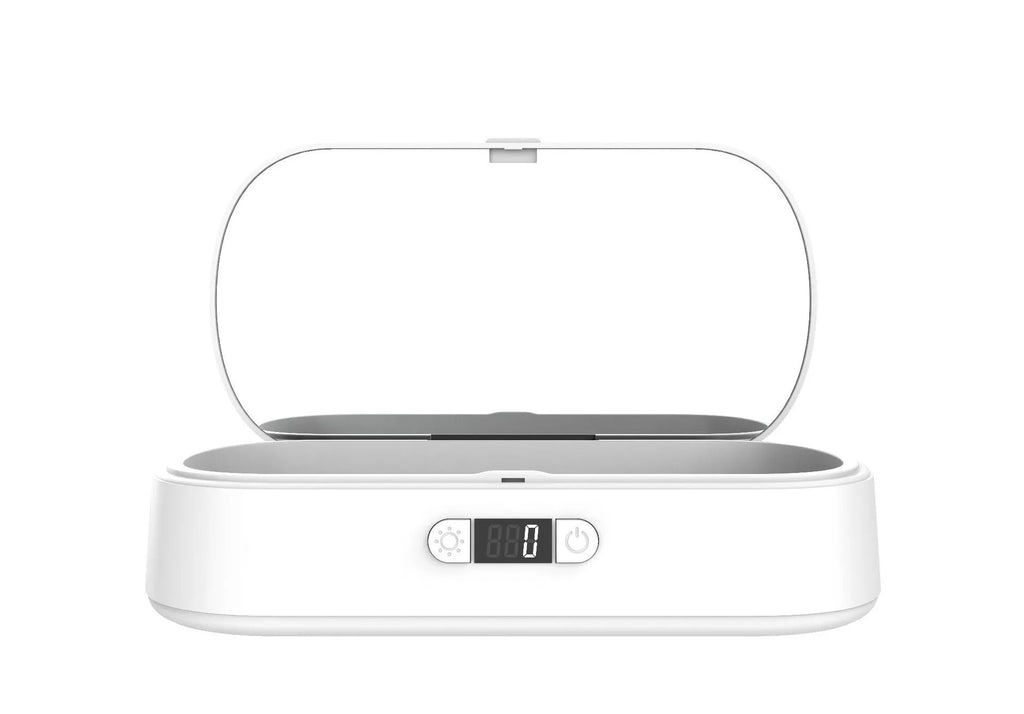 White ultraviolet steriliser box with wireless charging for mobile phones and small items.