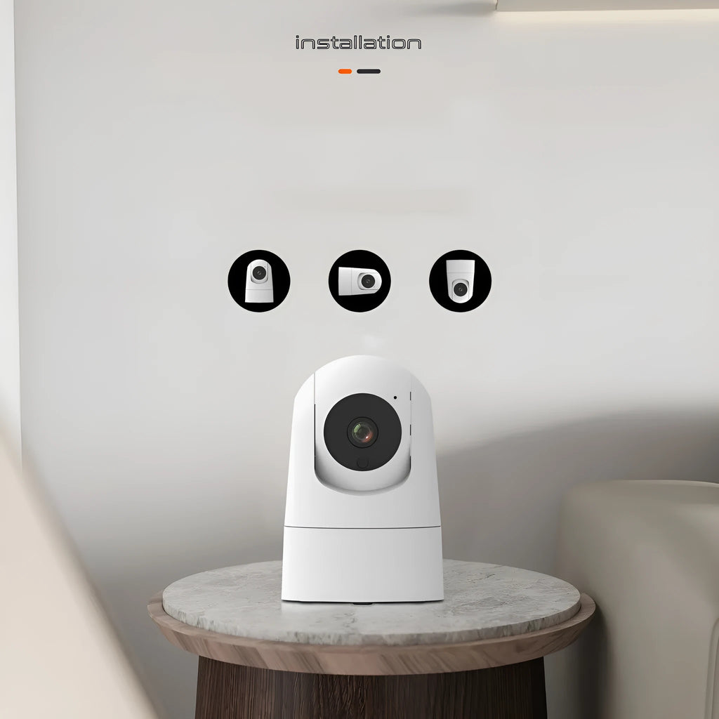 White indoor security camera with motorised base for 360° rotation on black mounting bracket
