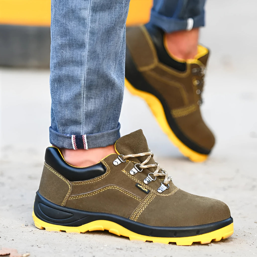 Bronze-coloured leather safety shoes with a steel toe cap and textured anti-slip sole.