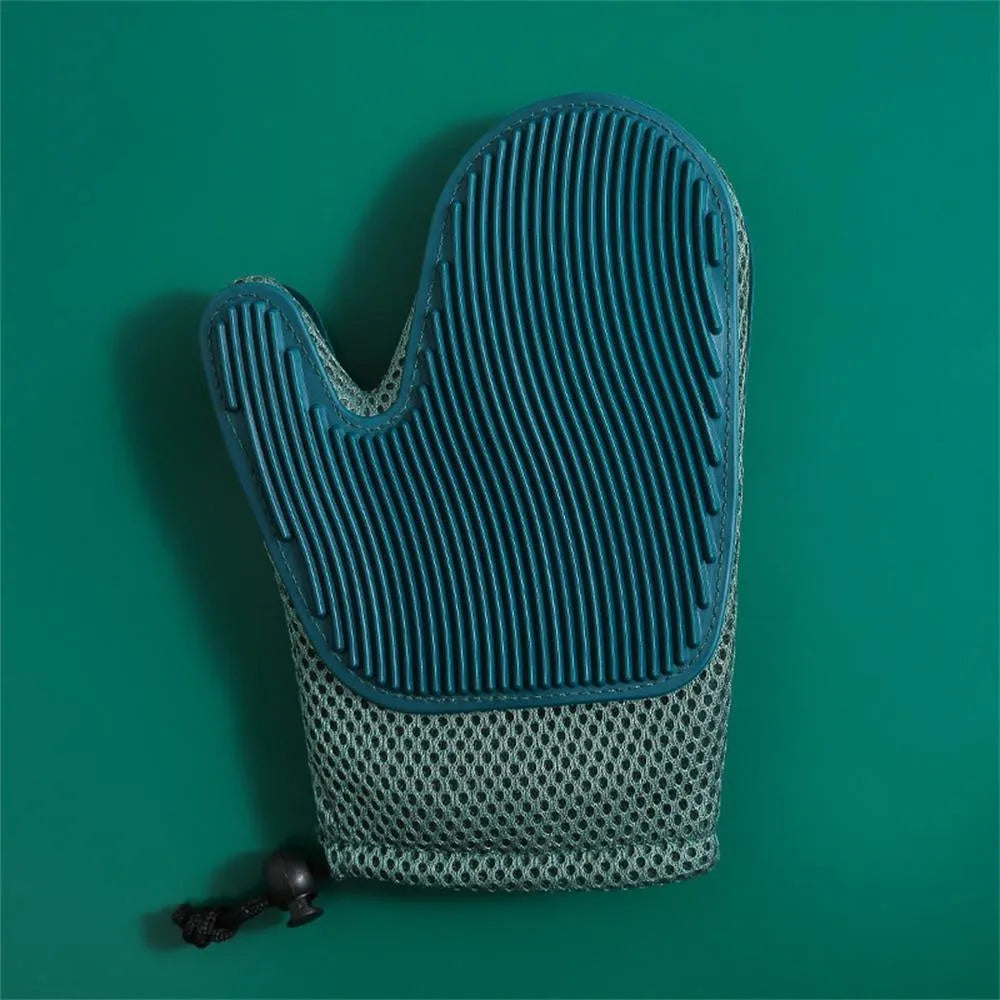 Dark blue mesh pet grooming glove for removing hair from dogs and cats