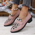 Leopard print suede slip-on shoes with a chunky mid heel and pointed toe on a rubber sole