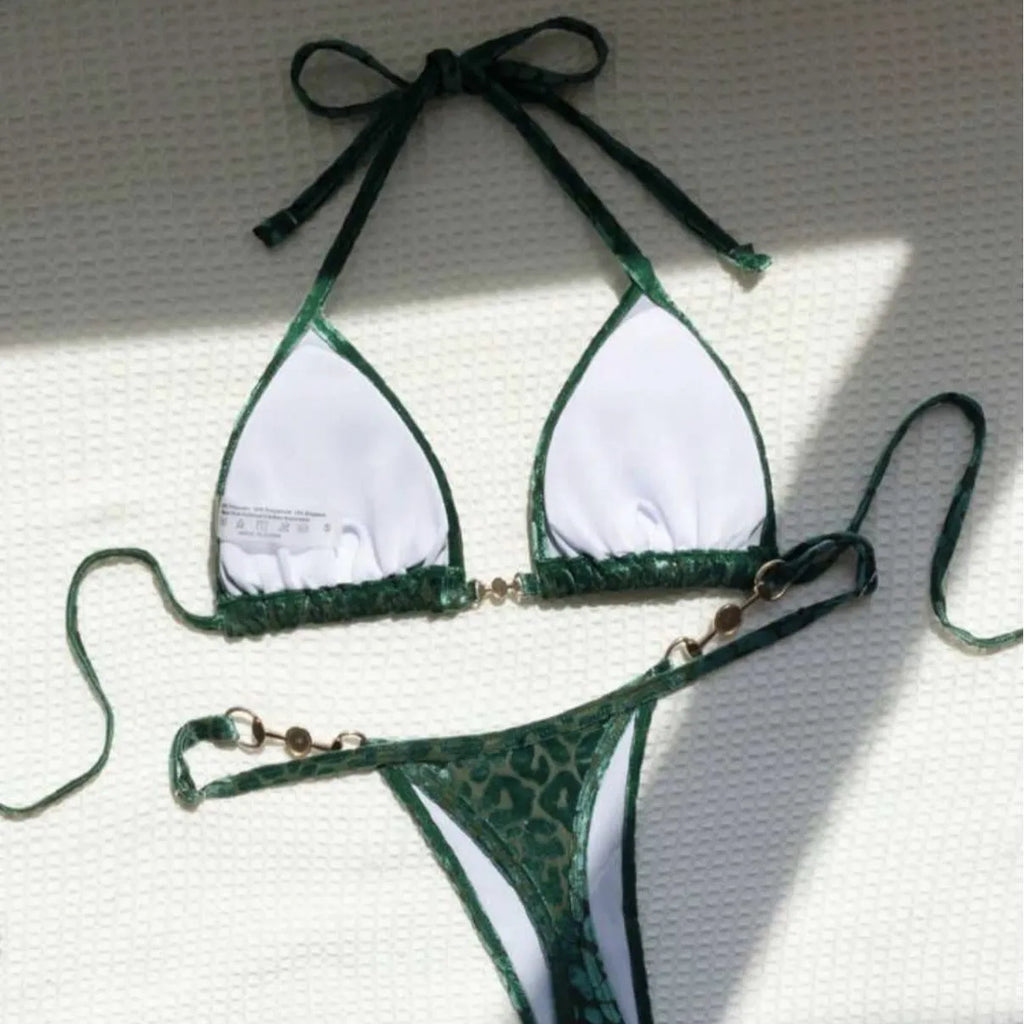 Women's blue leopard print T-shaped swimsuit bikini made from polyester and spandex fabric.