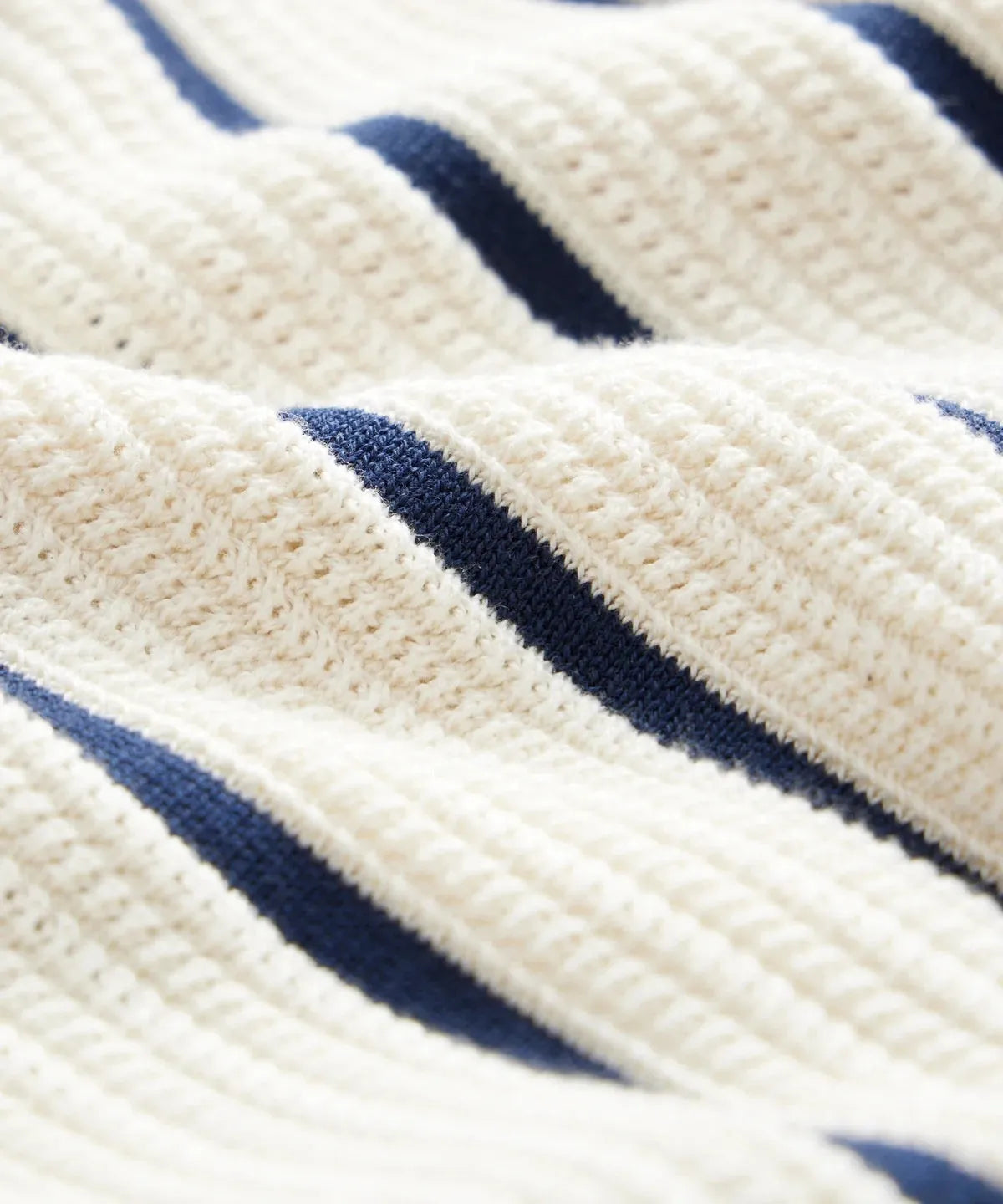 White men's knitted V-neck top with asymmetric British style design and short sleeves