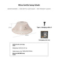 Wine bottle shaped camping lantern in beige colour with USB-C charging port