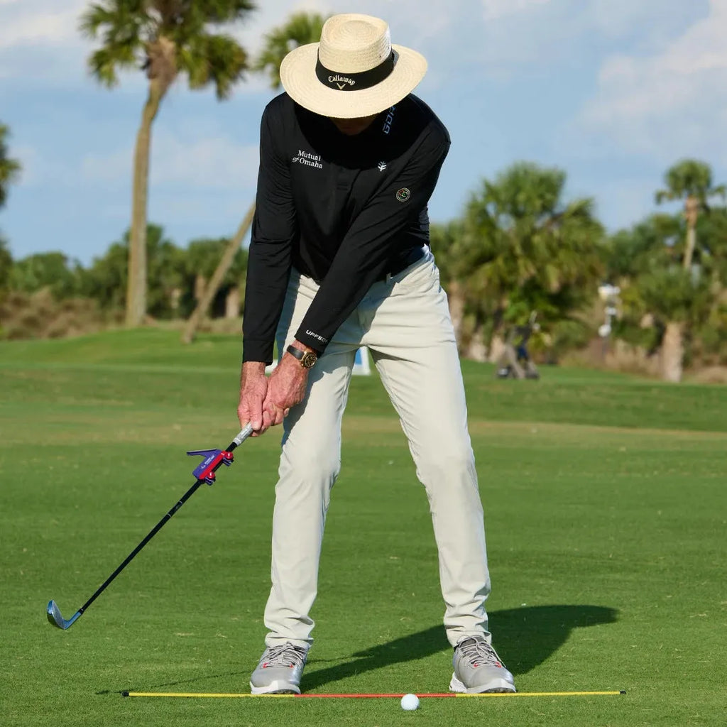 Golf swing plane training simulator in plastic construction showing logo and non-logo colour options