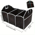 Black car multi-pocket trunk organiser with foldable lid and tie-down straps on car boot floor