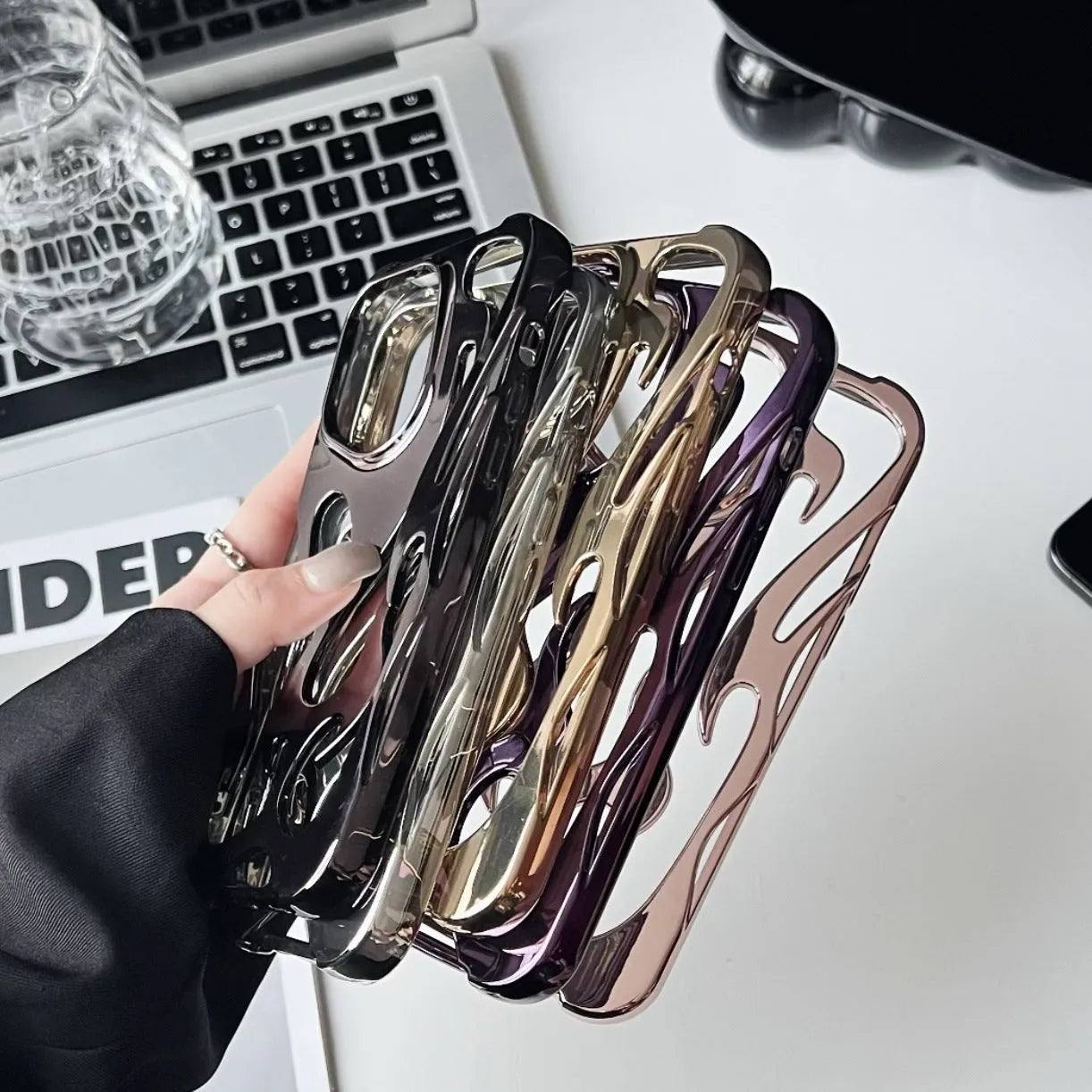 Electroplating hollow flame pattern design TPU phone case for Apple iPhone in metallic colours.