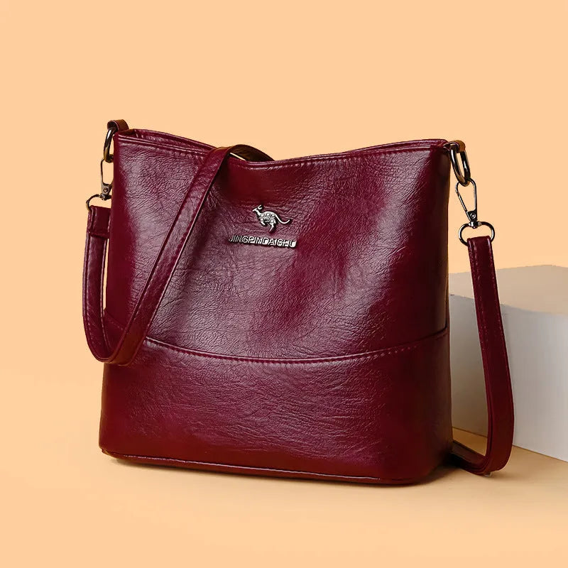 Women's soft leather shoulder bag in bucket style with large capacity and minimalist design
