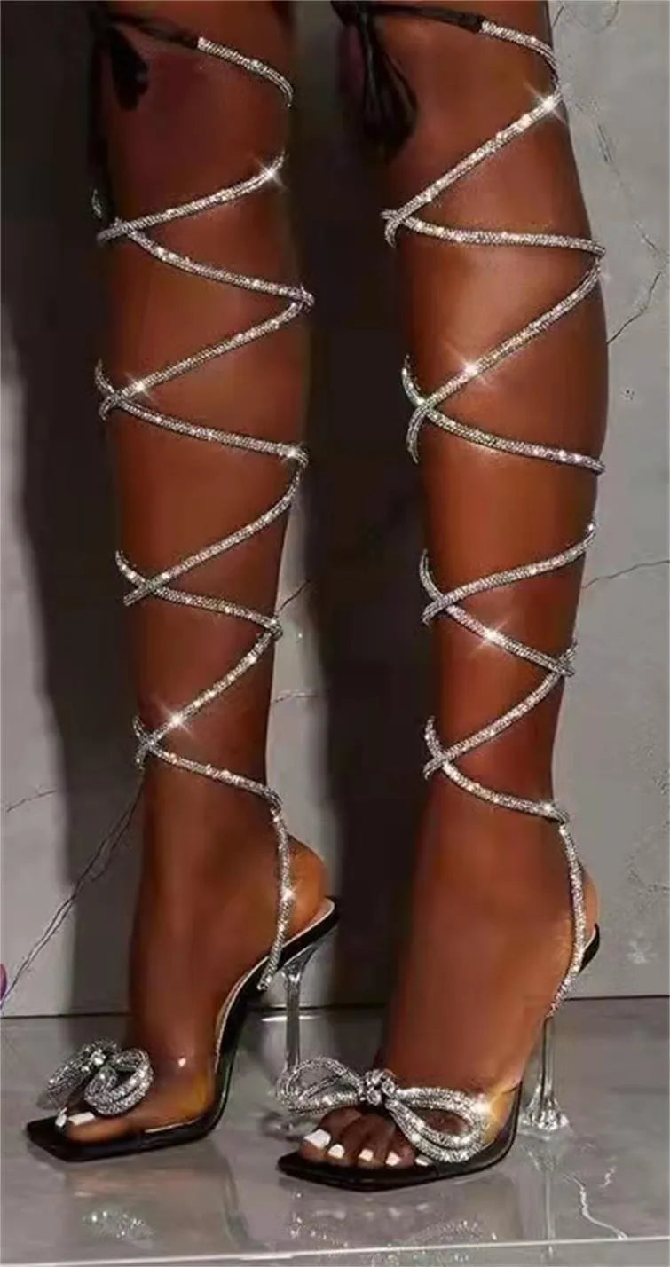 Plus size women's black sandals with sparkling Roman rhinestone straps and a square toe shape