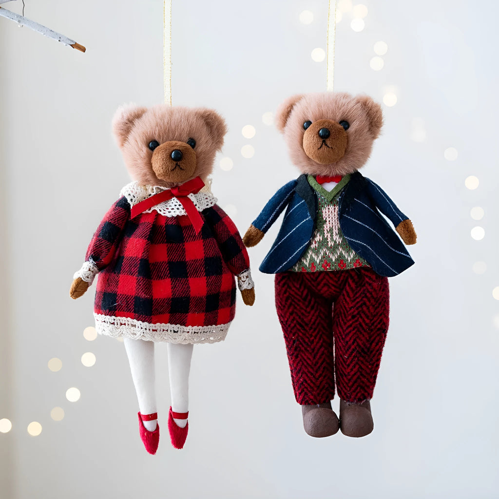 Cartoon plush bear doll wearing a cotton suit with a plaid print, in two colour options.
