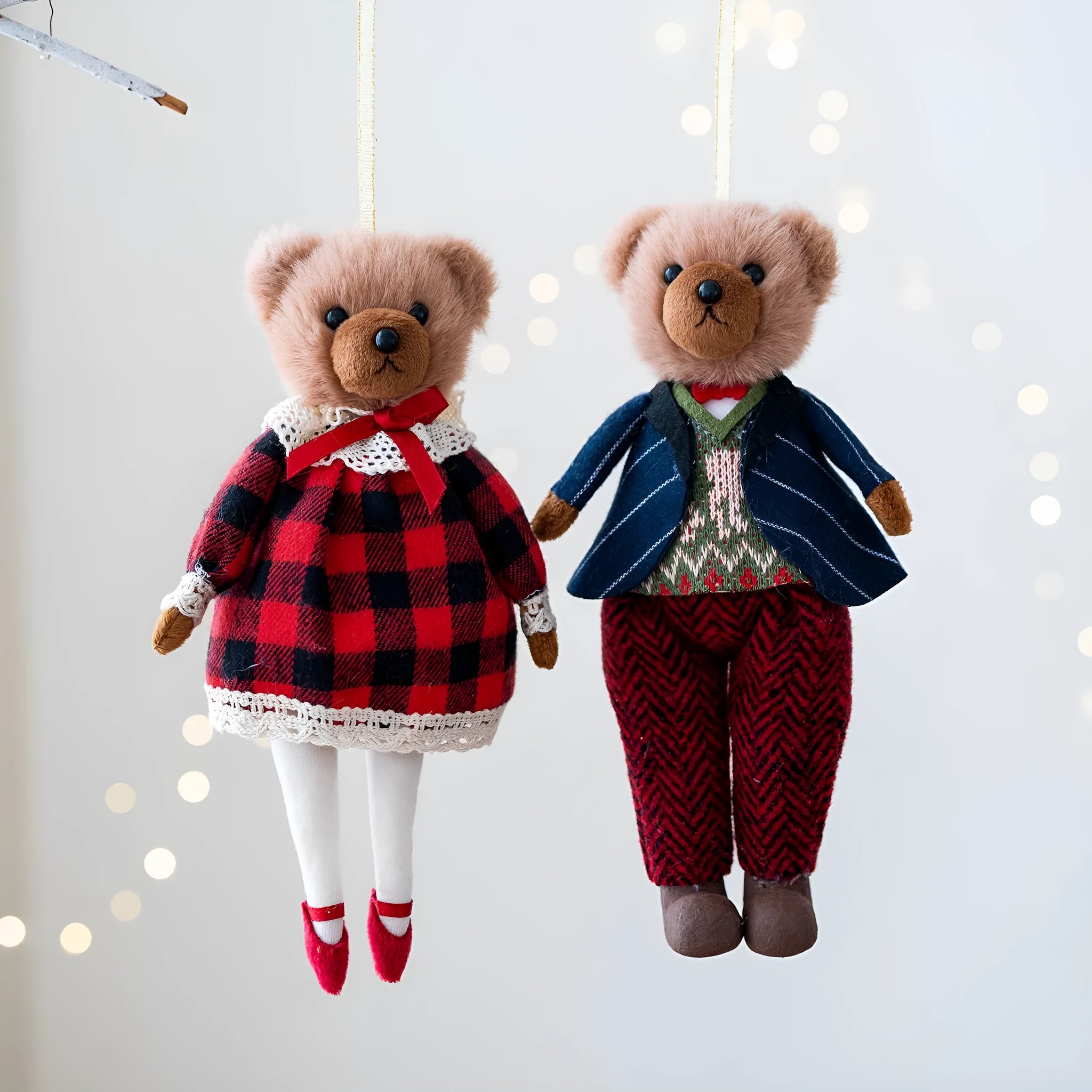 Cartoon plush bear doll wearing a cotton suit with a plaid print, in two colour options.