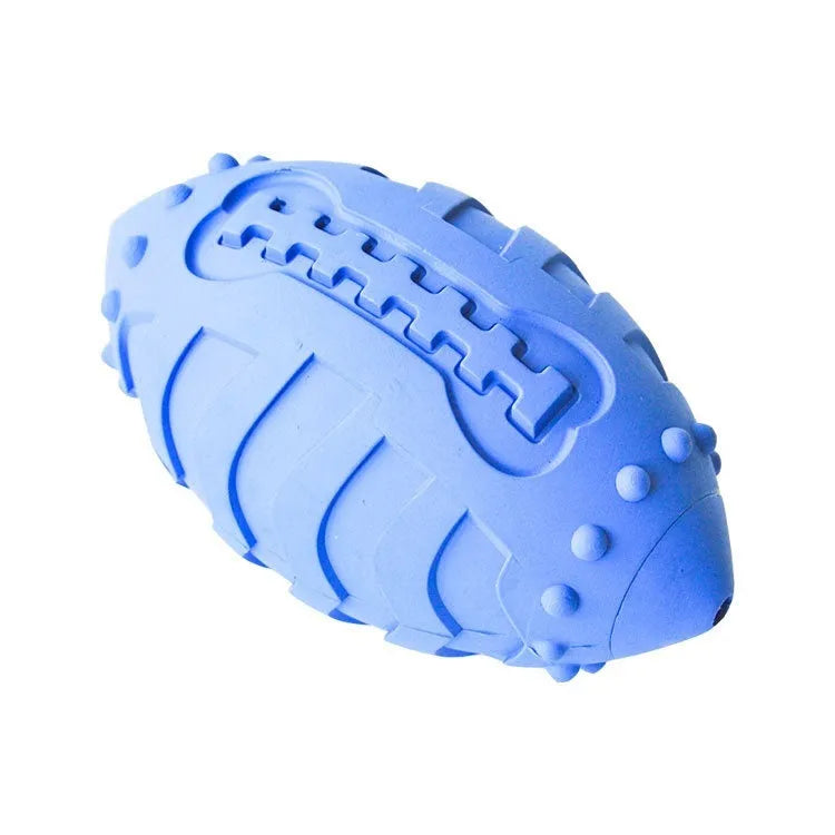 Bite-resistant rubber rugby ball dog toy in light green for teeth cleaning and training