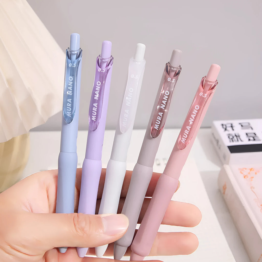 Macaron series press gel pen with 0.5mm tip in smoked brown, pink, or white ink options.
