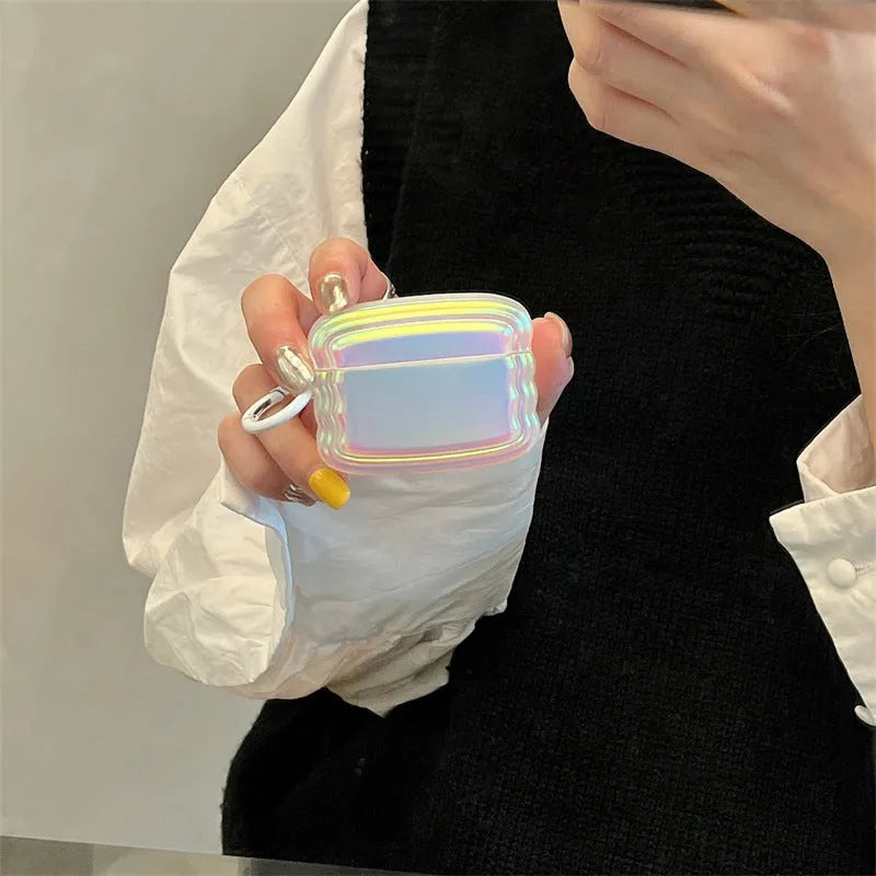 Silicone AirPods case with detailed magic laser and ring pattern design.