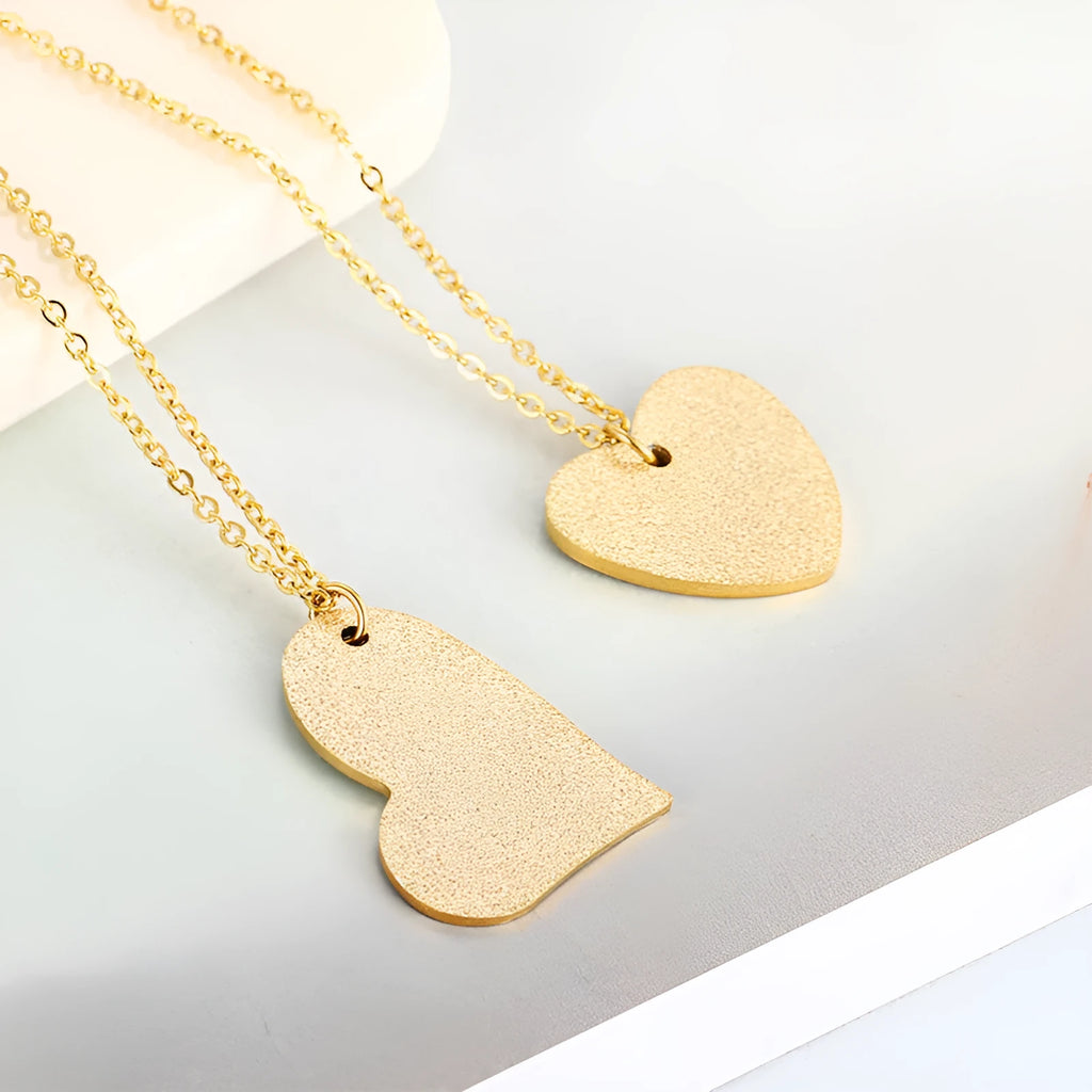 Women's titanium steel necklace with geometric heart-shaped pendant in colour KN25736-Z