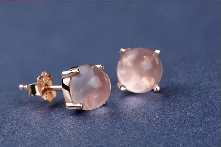 Women's rose gold plated silver earrings with synthetic quartz drop shape design