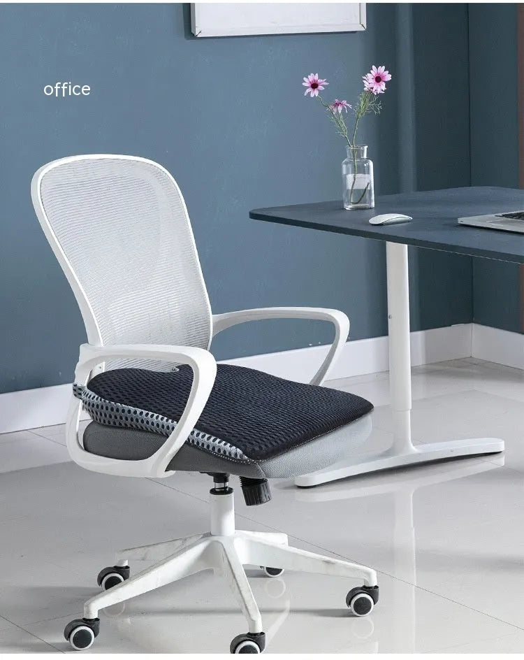 Memory foam car cushion with attachment straps in solid black colour on a car seat