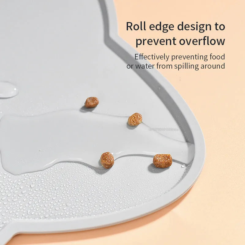 Blue silicone pet feeding mat with raised border for dog and cat food bowls