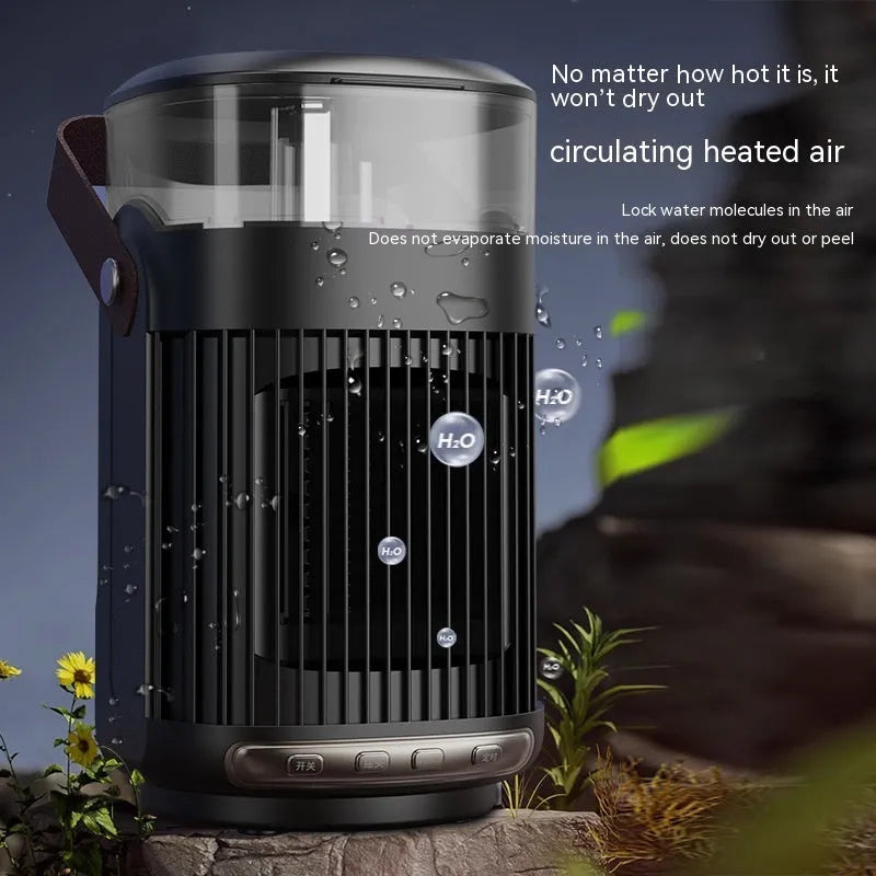 Black portable personal heater with humidifier showing front control panel and compact design