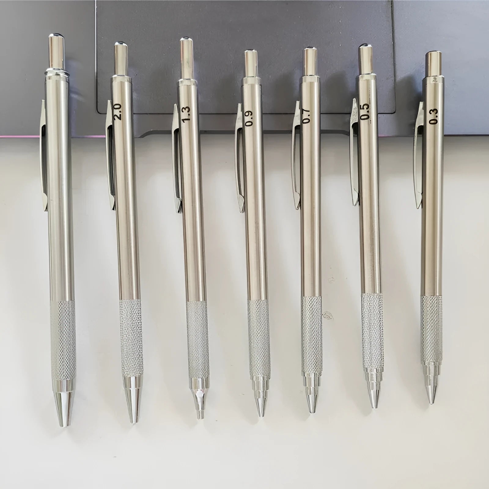 Metal automatic mechanical pencil with multiple lead size options including 0.5mm, 0.7mm, 0.9mm, 1.3mm, and 2.0mm