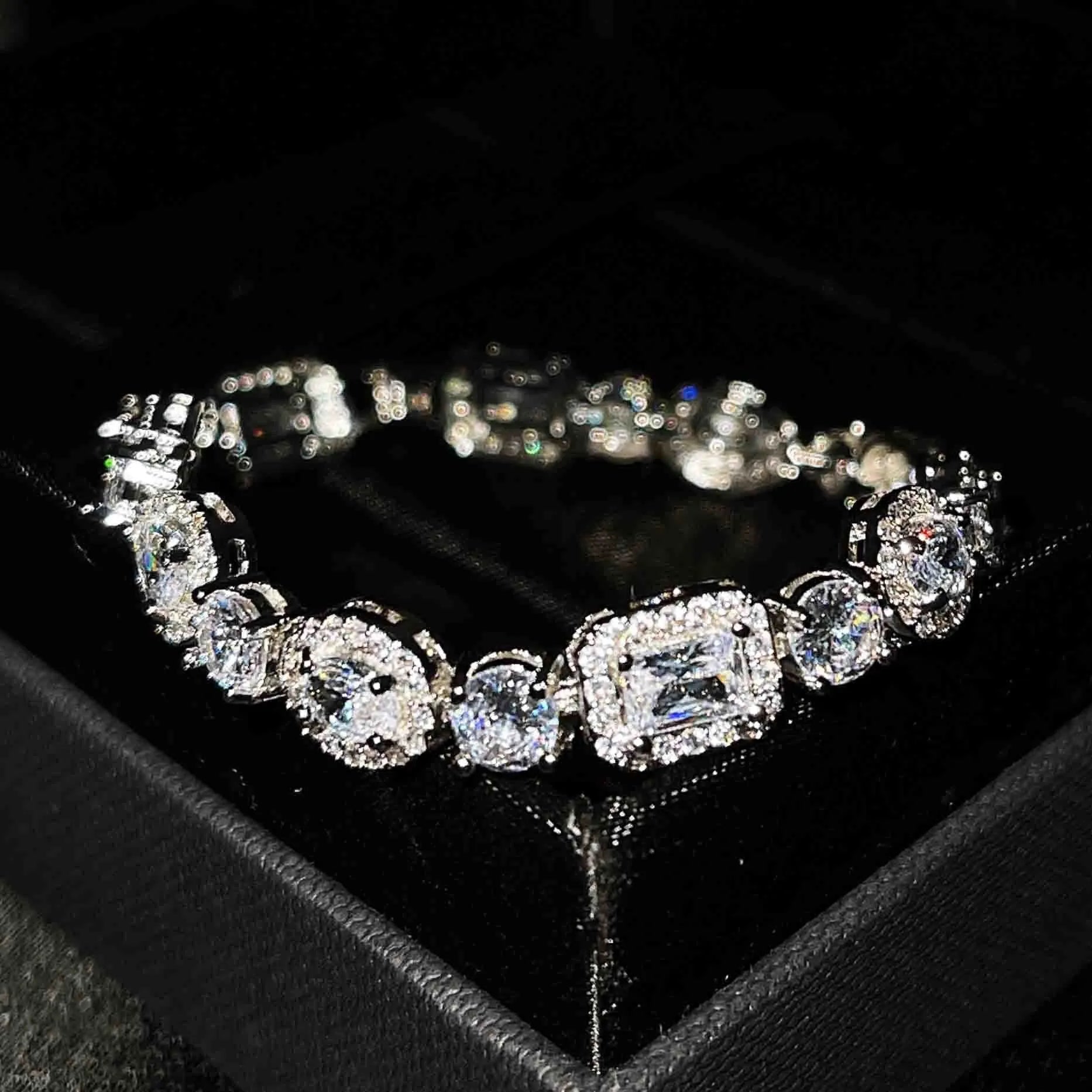 Women's geometric bracelet with S925 sterling silver plating and inlaid zircon stones showing adjustable chain