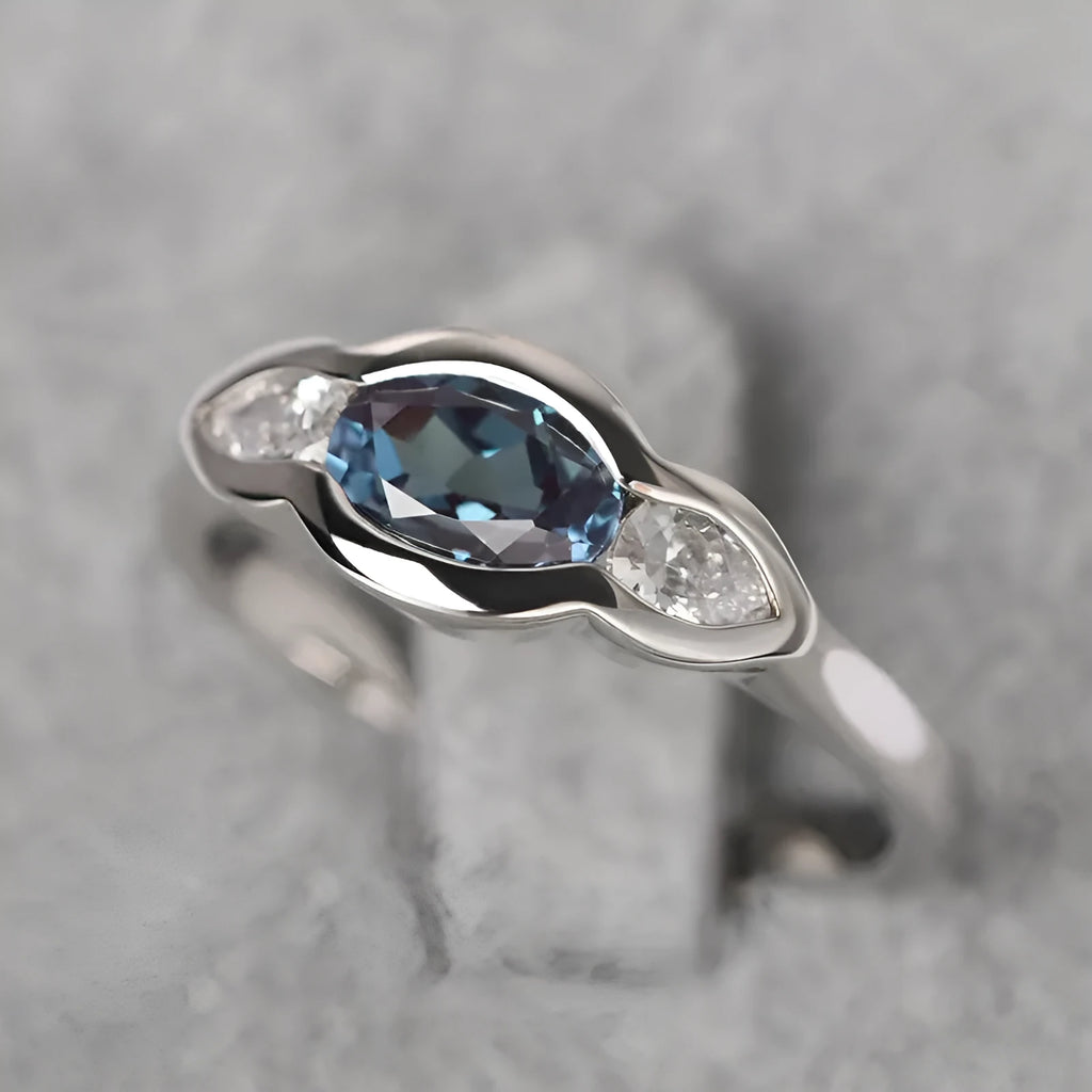 Women's geometric ellipse ring with white gold colour finish and inlaid zircon stones