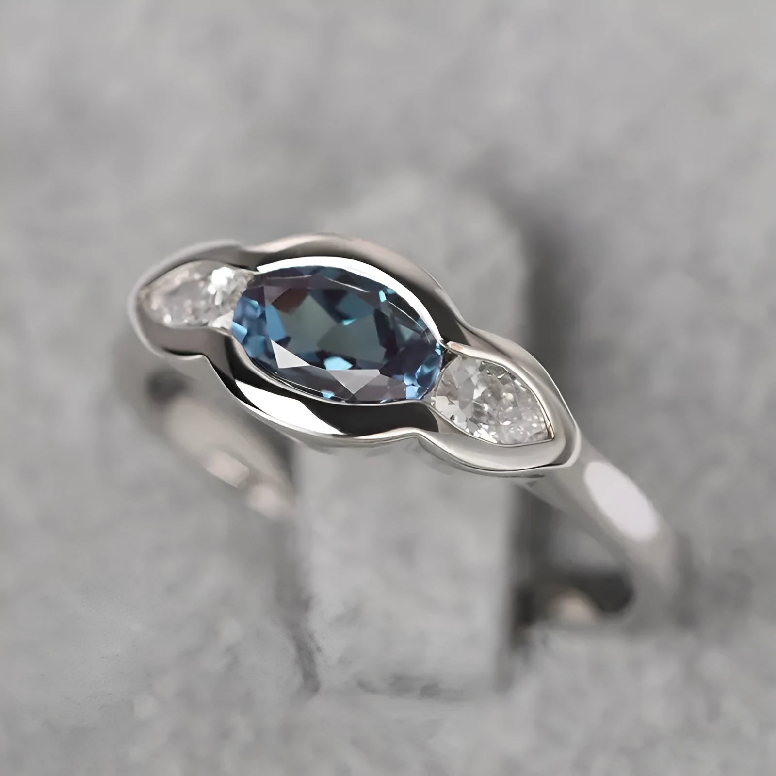 Women's geometric ellipse ring with white gold colour finish and inlaid zircon stones