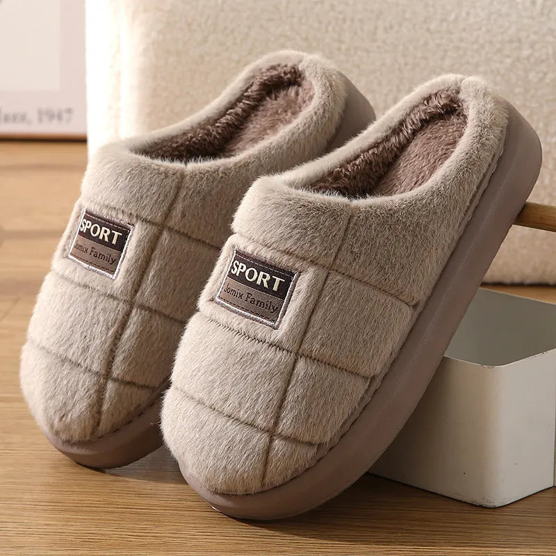 Men's grey and brown plaid rabbit hair slippers with thick wool lining and a flat EVA sole.