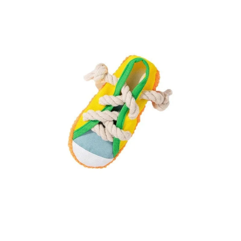 Plastic dog slipper chew toy with squeaker in yellow, black, or blue colour options