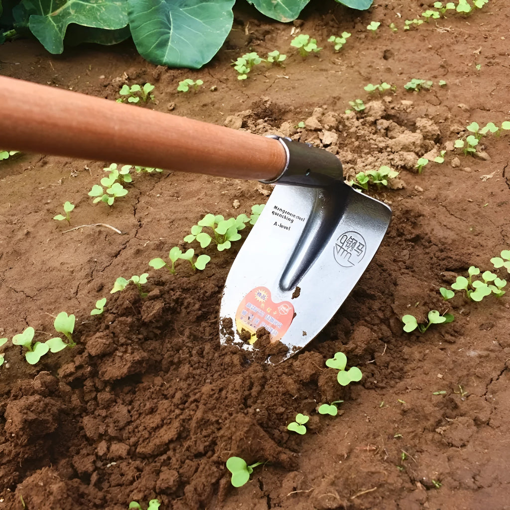 Agricultural pointed hoe plough tool with a steel horse tip and flat blade.