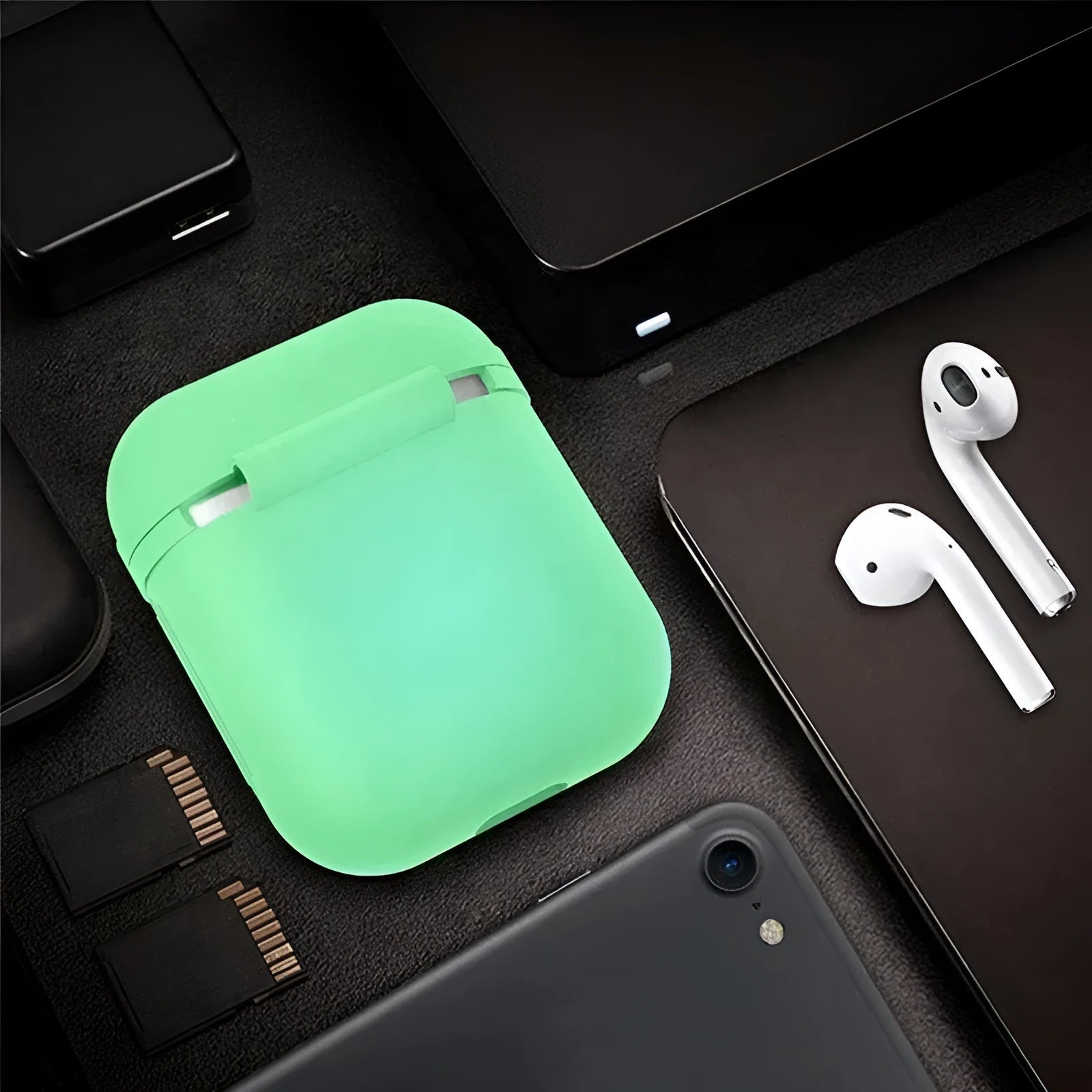 Luminous solid colour silicone flip-top protective case for AirPods wireless earphones.