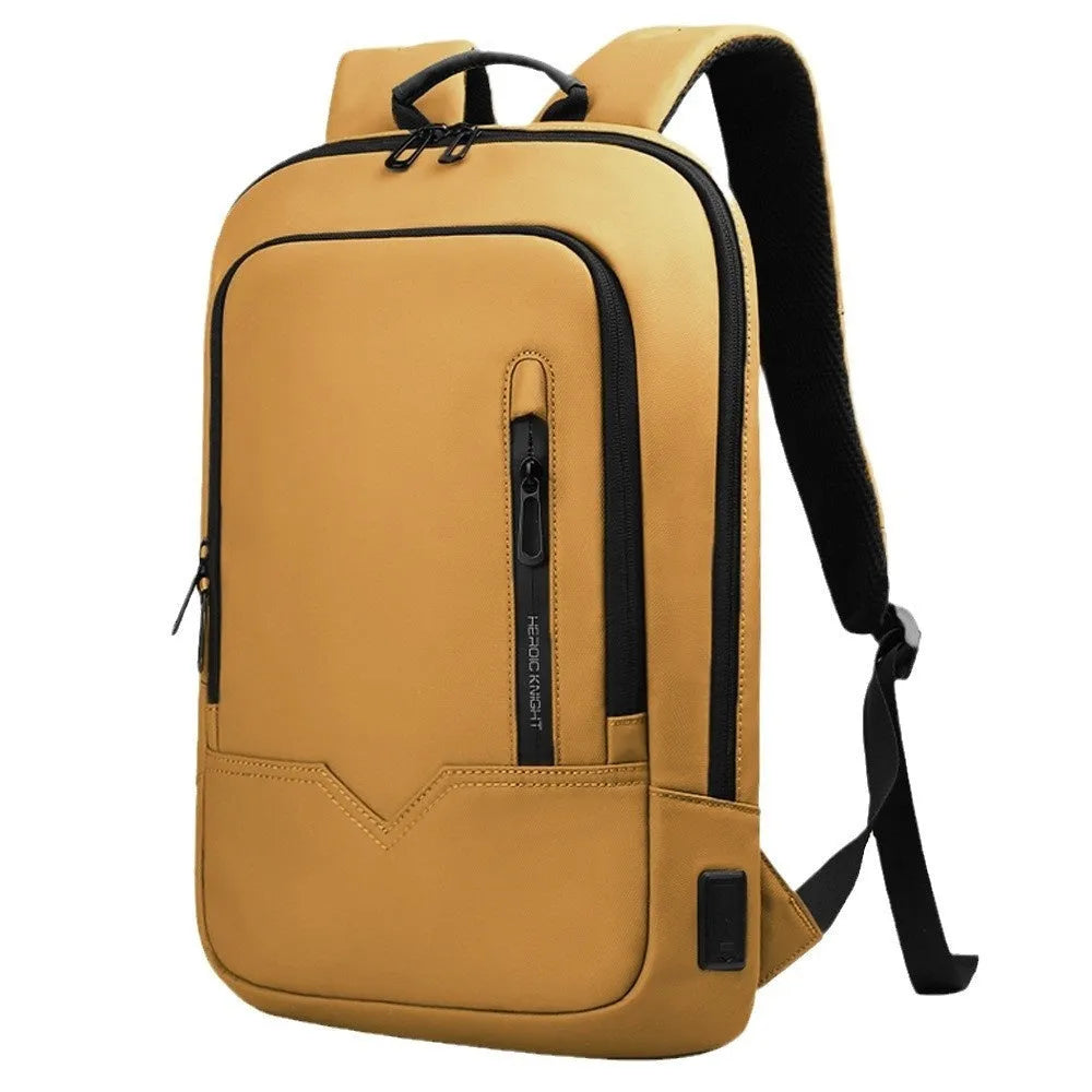 Lightweight black polyester laptop backpack with USB charging port shown next to a 14-inch laptop.