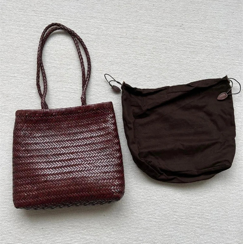 Brown woven leather tote bag with three-dimensional pockets measuring 27x30x6cm